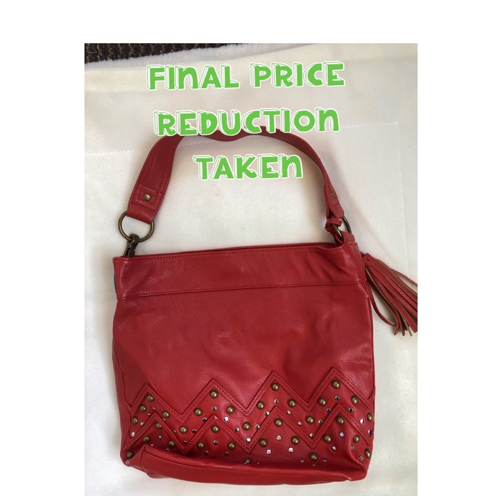 Faux leather bucket bag by Carlos Santana
